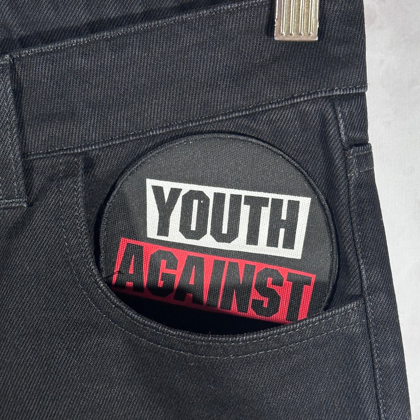 RAF Simons S/S21 Black ‘Youth Against’ Cropped Patch Denim