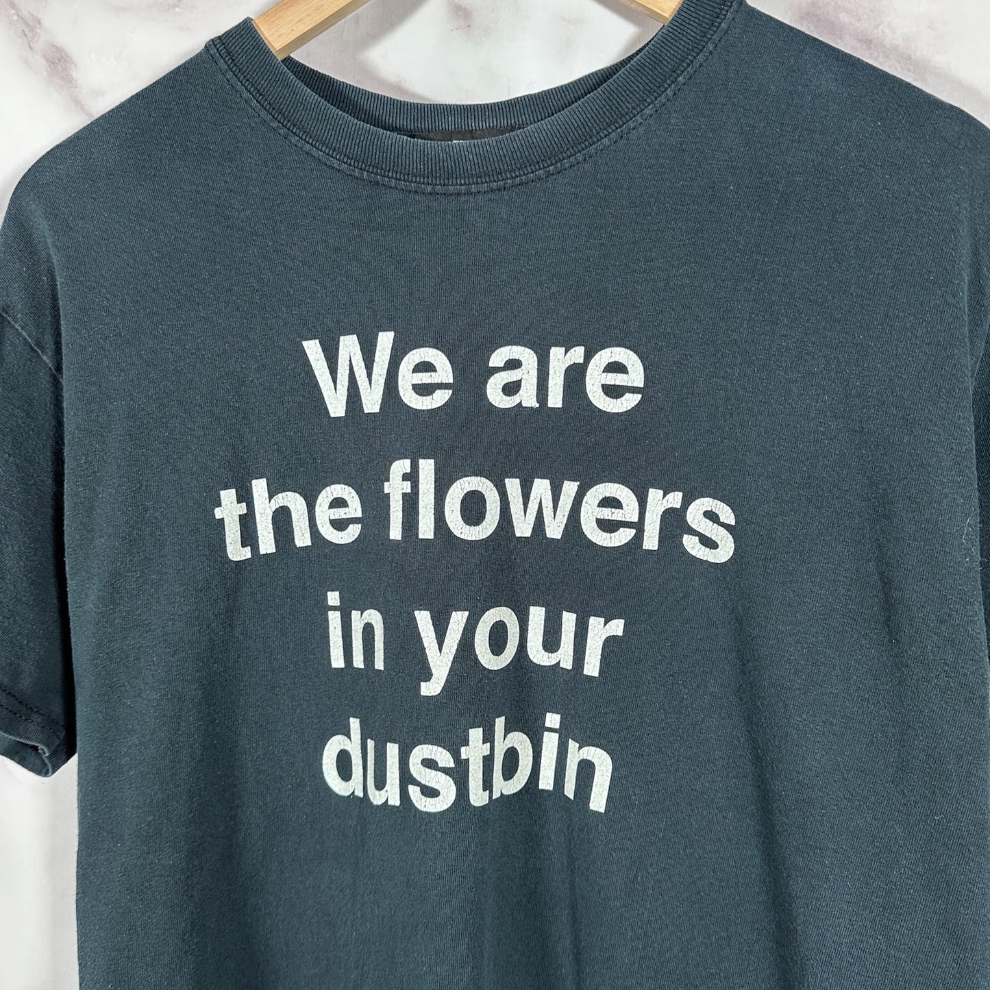 Undercover ‘We are the flowers in your dustbin’ Black Text Tee