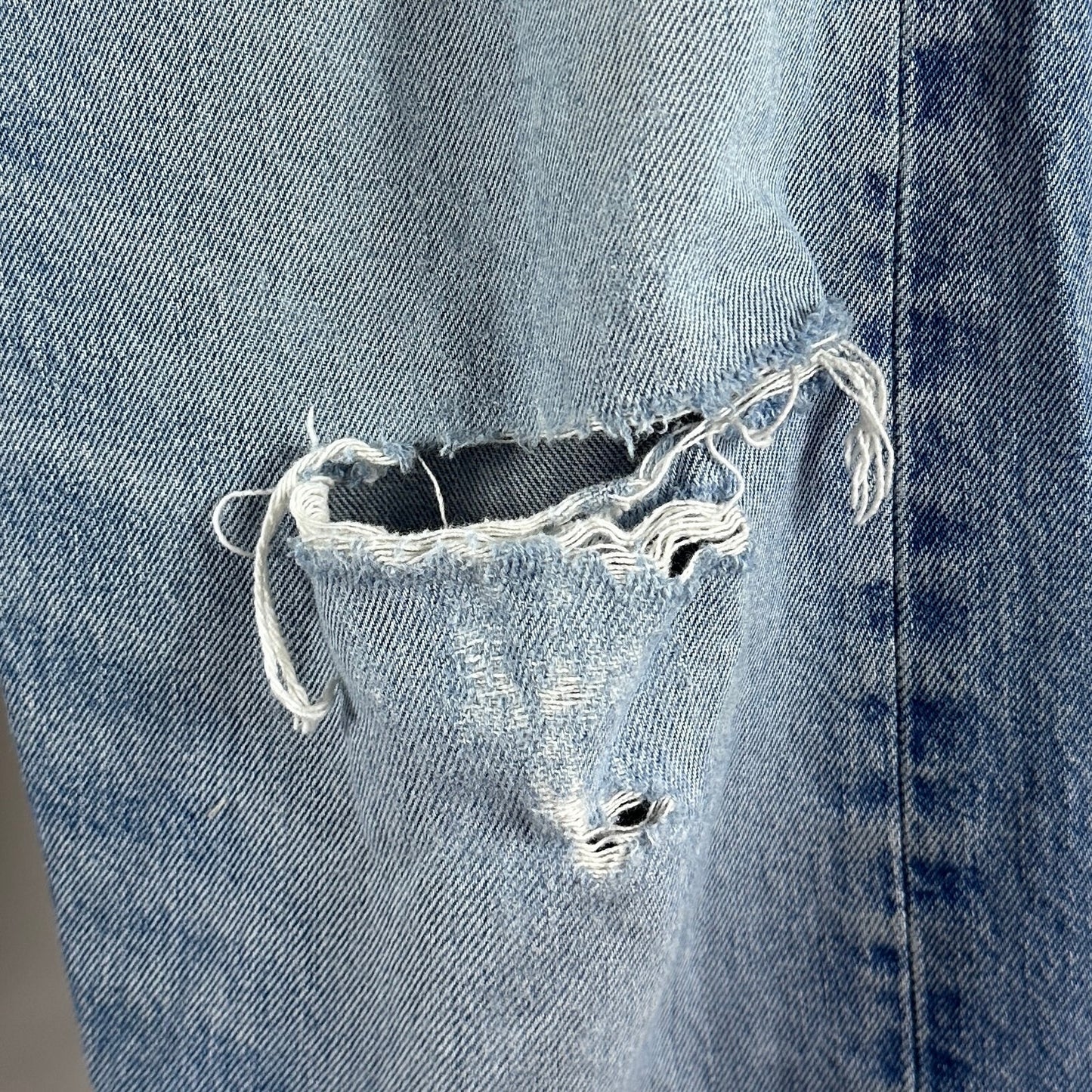 Levi's 501 Light Wash Distressed Denim Jeans